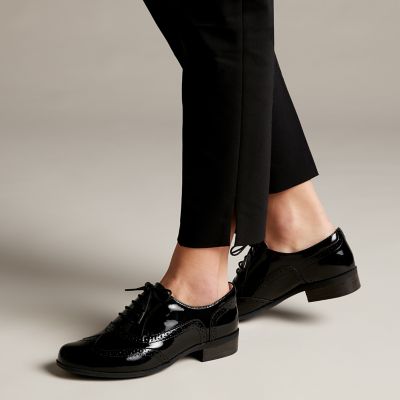 clarks black patent brogues