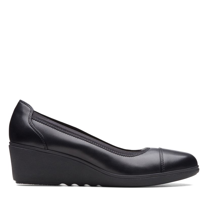 Black leather wedge shoes