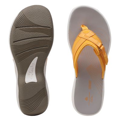 yellow clarks flip flops