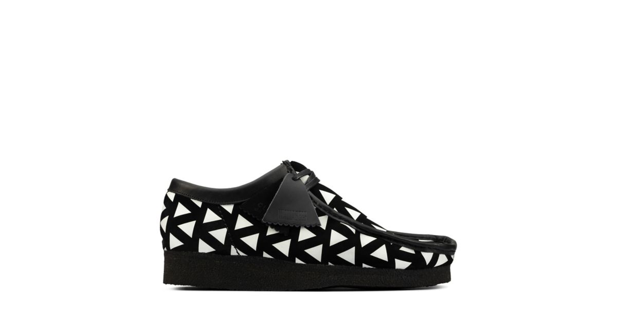black and white wallabees