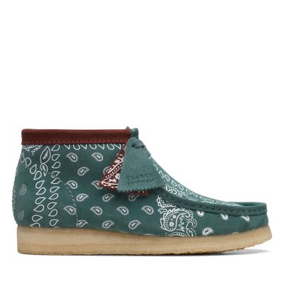 green suede wallabees