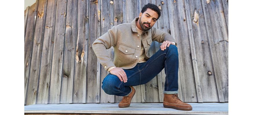 Man wearing brown leather ankle boots