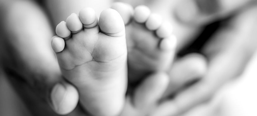 Baby feet in black and white
